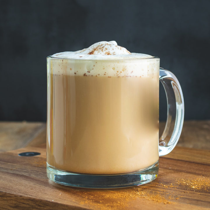 homemade pumpkin spice chai latte in glass cup