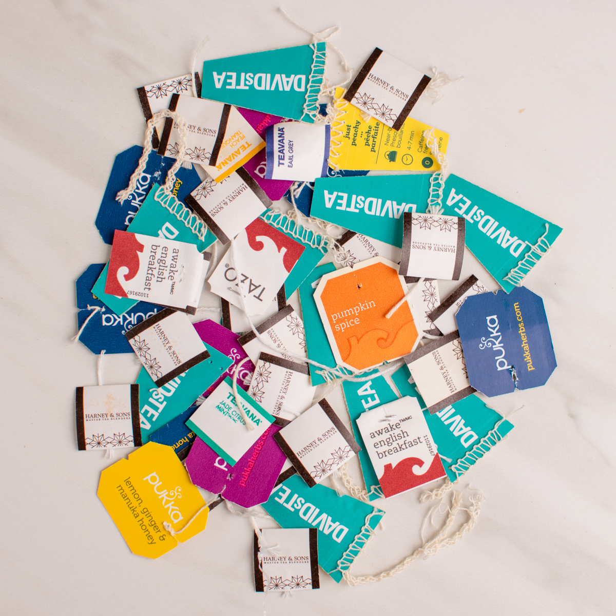 pile of saved tea bag tags