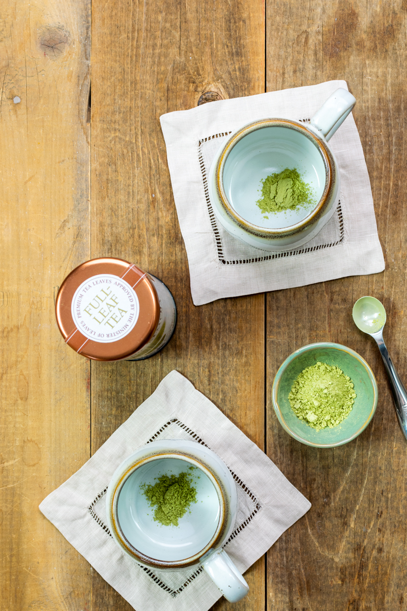 matcha powder in cups to make a hot latte