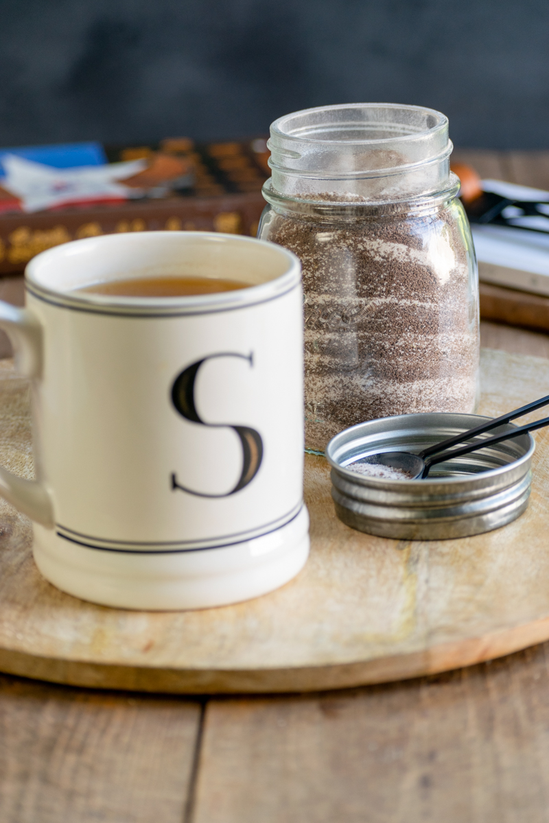 Jar of spiced tea mix and a mug of friendship tea