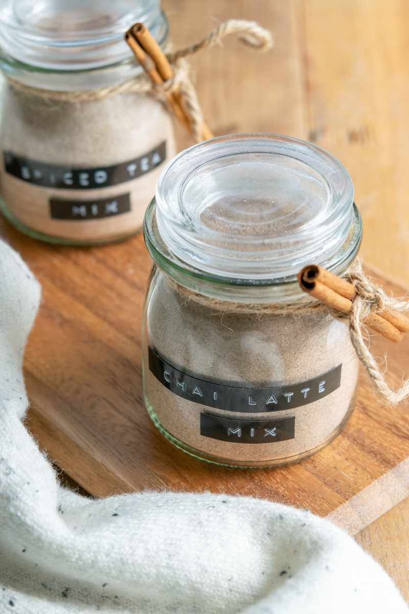 jars of spiced tea mix (friendship tea) and chai latte mix decorated with twine and cinnamon sticks