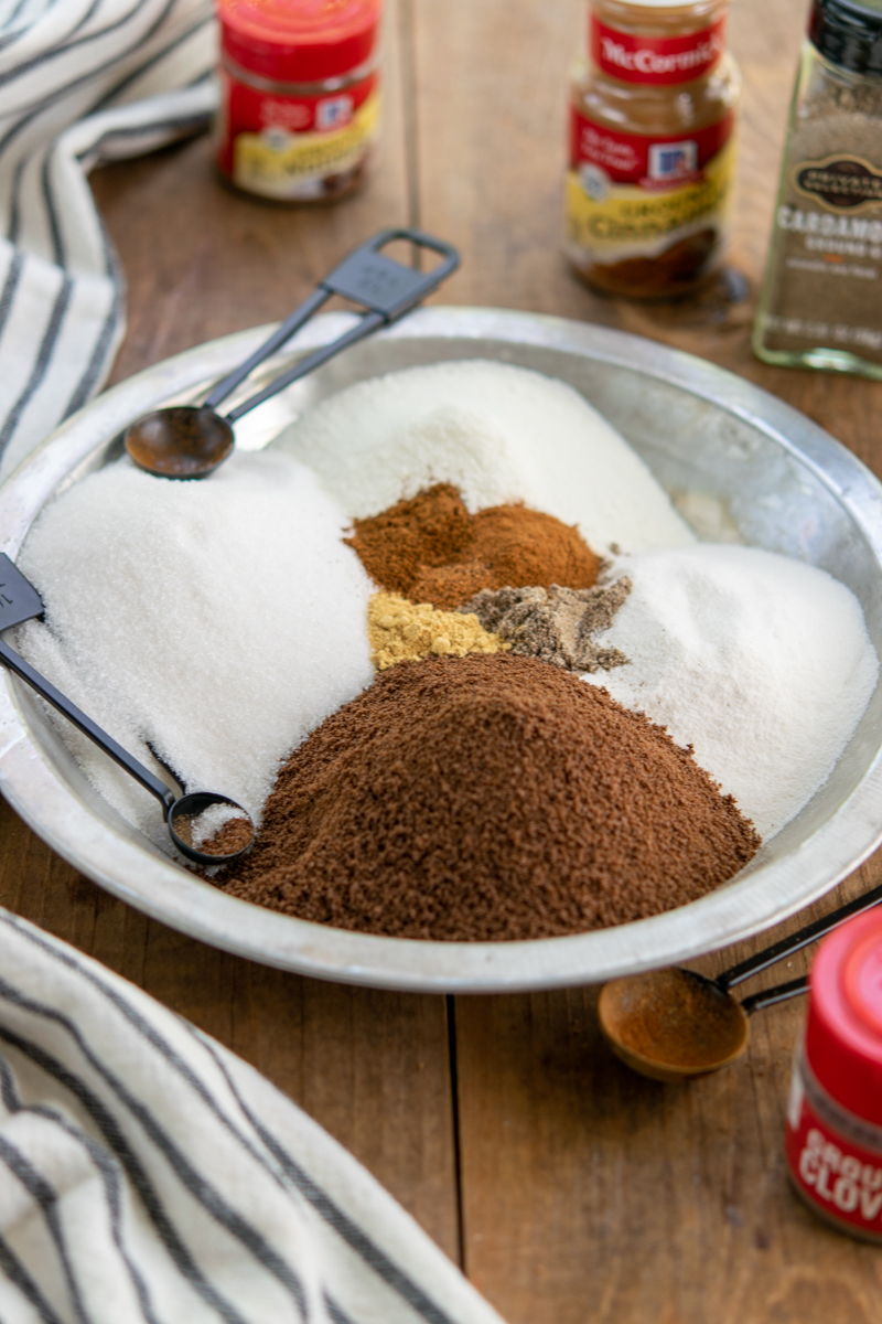 tray with piles of spices and other ingredients for recipe