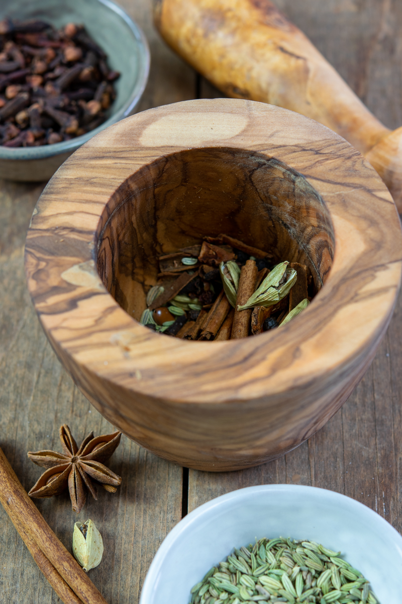 chai spices in mortar and pestle