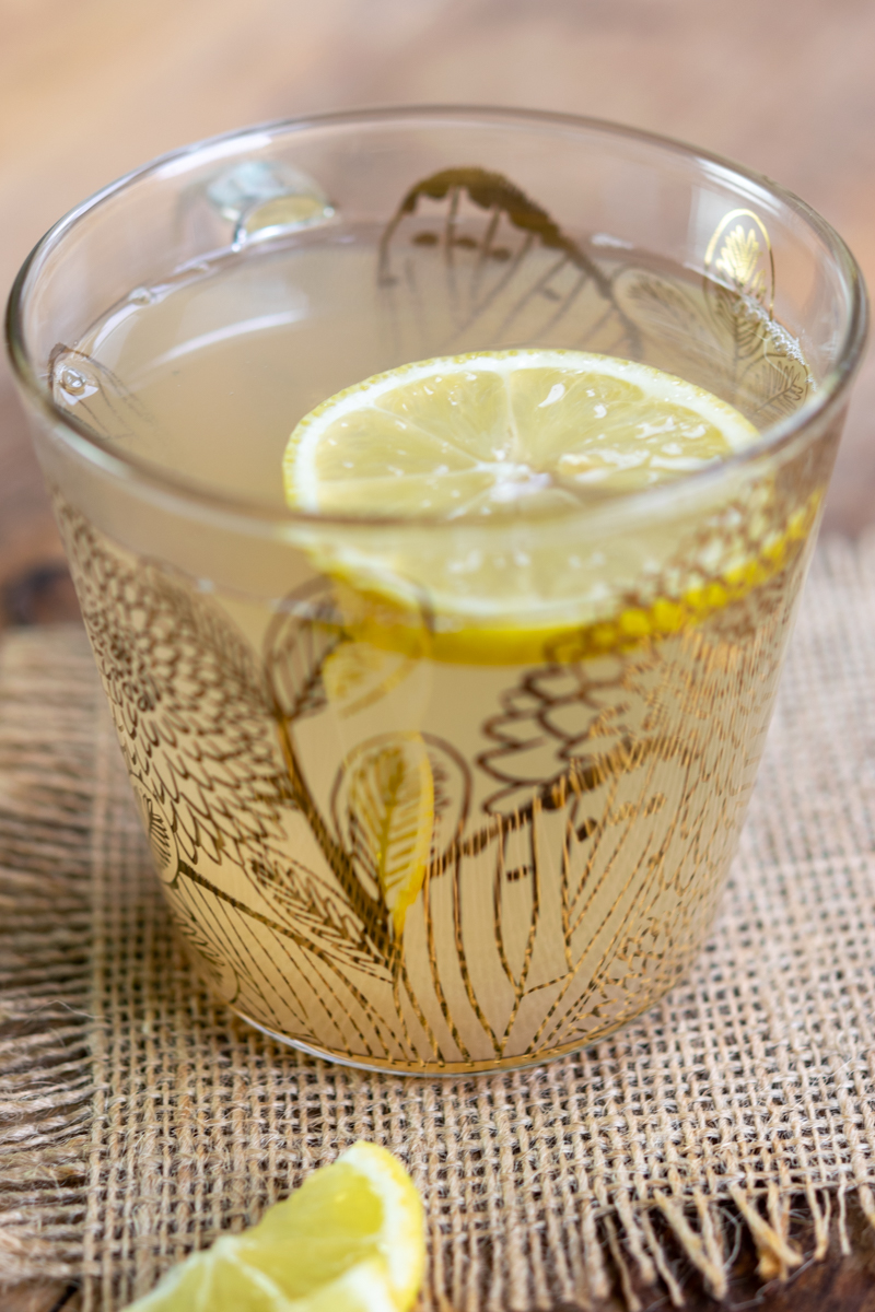 hot ginger tea and lemon wedge made from homemade recipe