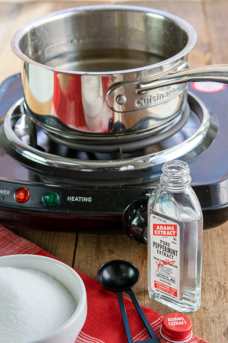 making starbucks peppermint syrup at home in a saucepan on the stove