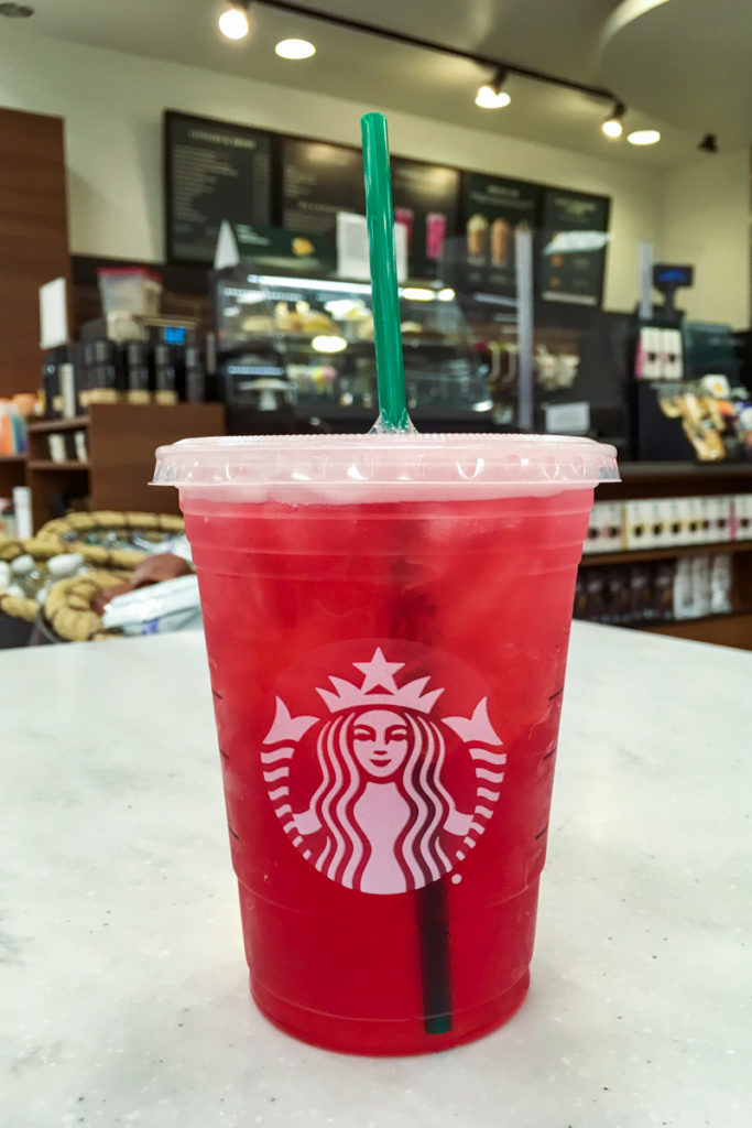 starbucks iced passion tango tea with green straw
