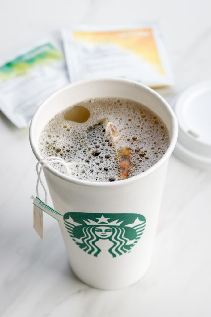 Making Medicine Ball tea with steamed lemonade and Teavana tea bags.