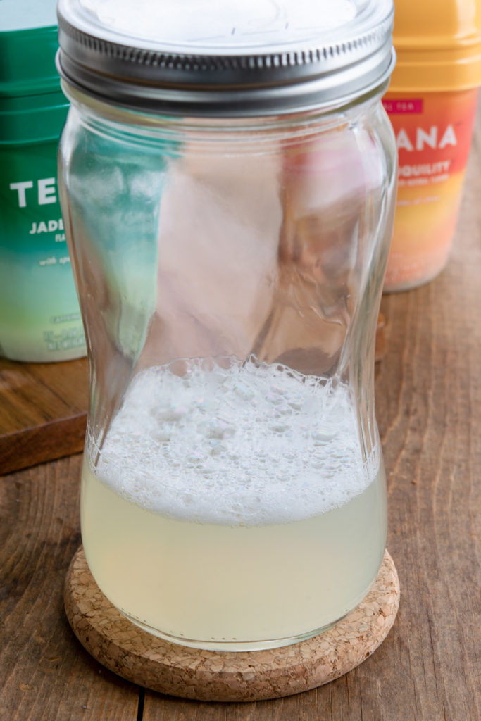 frothy steamed lemonade in a mason jar