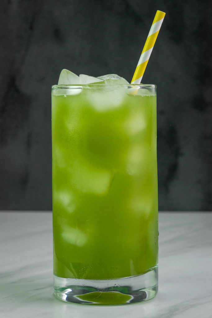 glass of matcha lemonade with ice