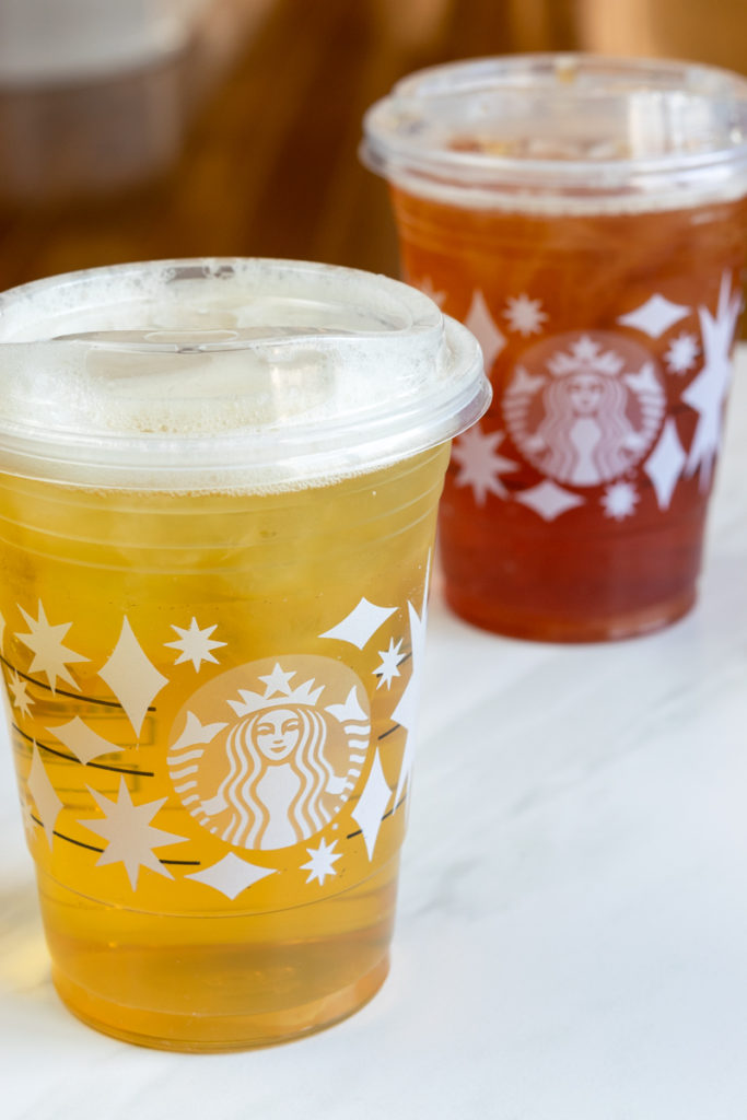 two cups of starbucks iced tea