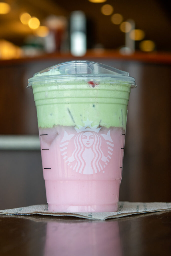 Starbucks Pink Drink with matcha cold foam added on top.