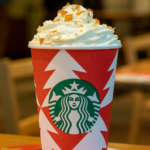 Caramel Brulee Creme steamer in a Starbucks red cup for the holidays.