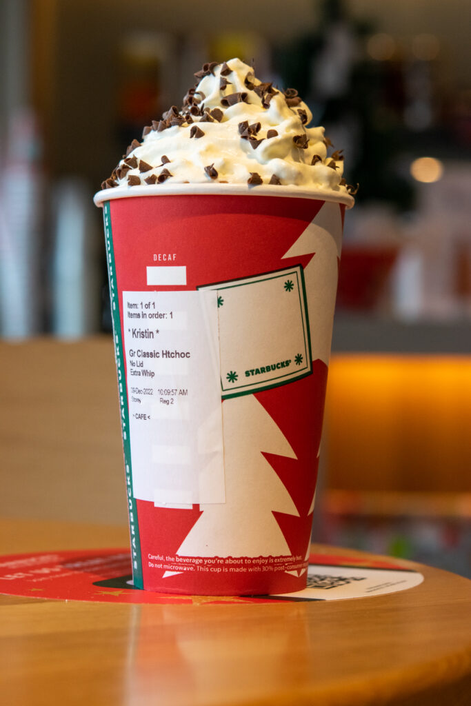 Starbucks Hot Chocolate with chocolate curls on top.