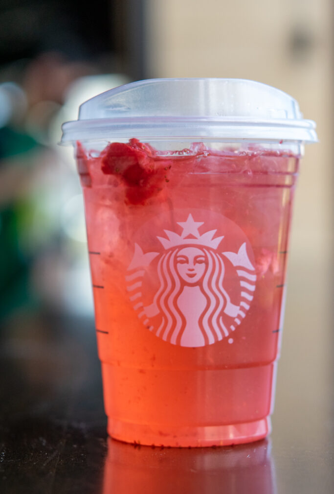 A grande Starbucks Strawberry Acai Refreshers beverage.