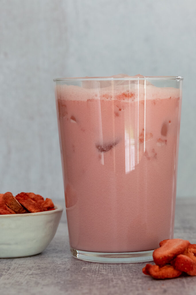 Copycat Starbucks drink made with keto pink drink recipe poured in a glass.
