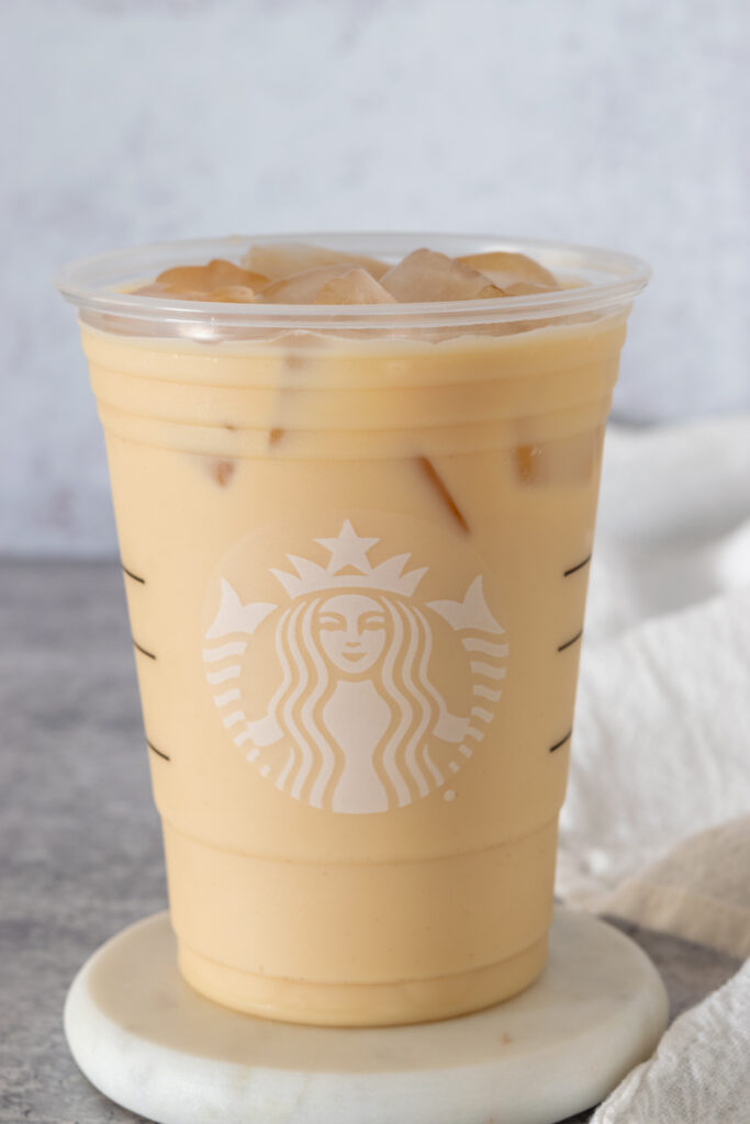An iced London Fog tea latte made at home in a Starbucks cup.
