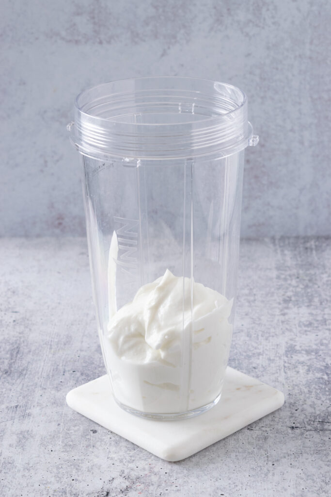 Greek yogurt added to blender.