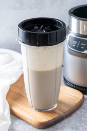 A smoothie in a personal cup Ninja blender.