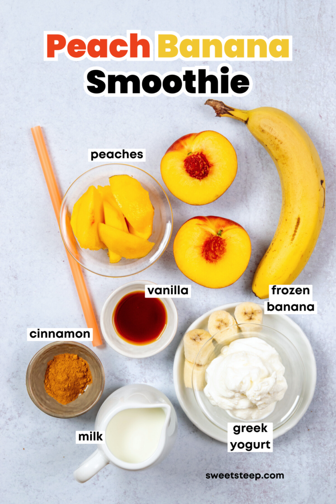An overhead photo of all the ingredients needed to make a homemade peach banana smoothie. The ingredients are each labeled, including peaches, frozen banana, vanilla extract, ground cinnamon, milk and Greek yogurt.