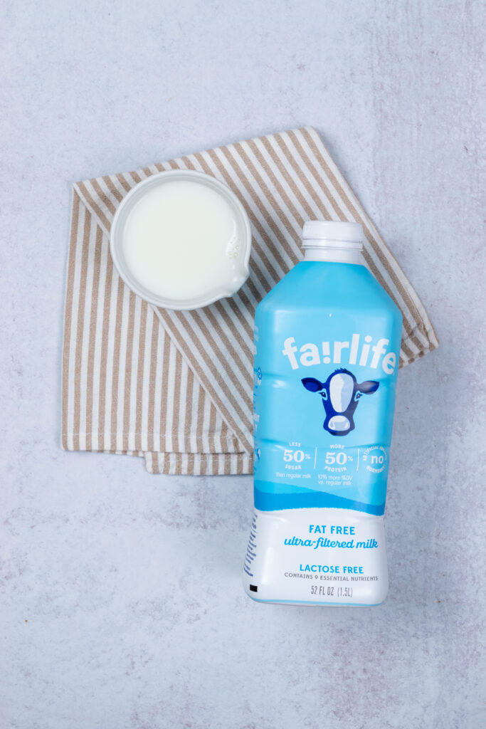 A bottle of Fairlife ultra-filtered milk with the label showing that it has 50% more protein than regular milk, perfect for making protein-filled smoothies.