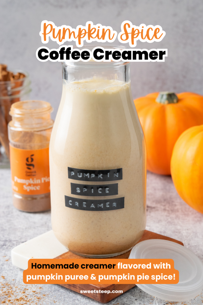A bottle of homemade pumpkin spice creamer. There's a bottle of pumpkin pie spice, some cinnamon sticks and some pumpkins next to the creamer. The image has text overlay that reads, "Pumpkin Spice Coffee Creamer. Homemade creamer flavored with pumpkin puree and pumpkin pie spice."