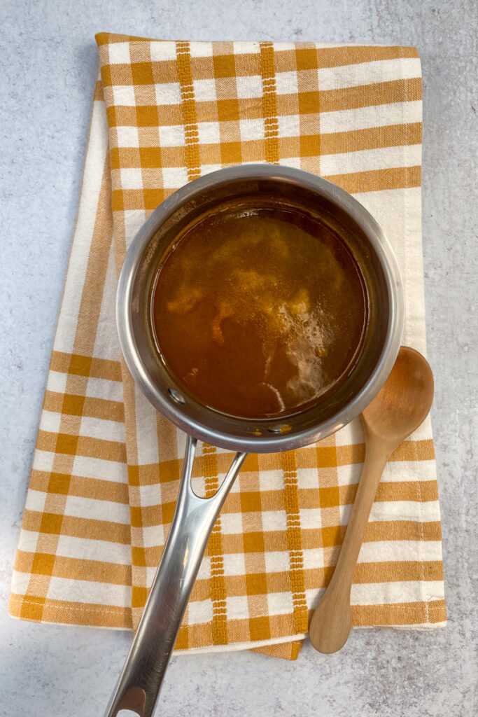 Whisking the syrup together.