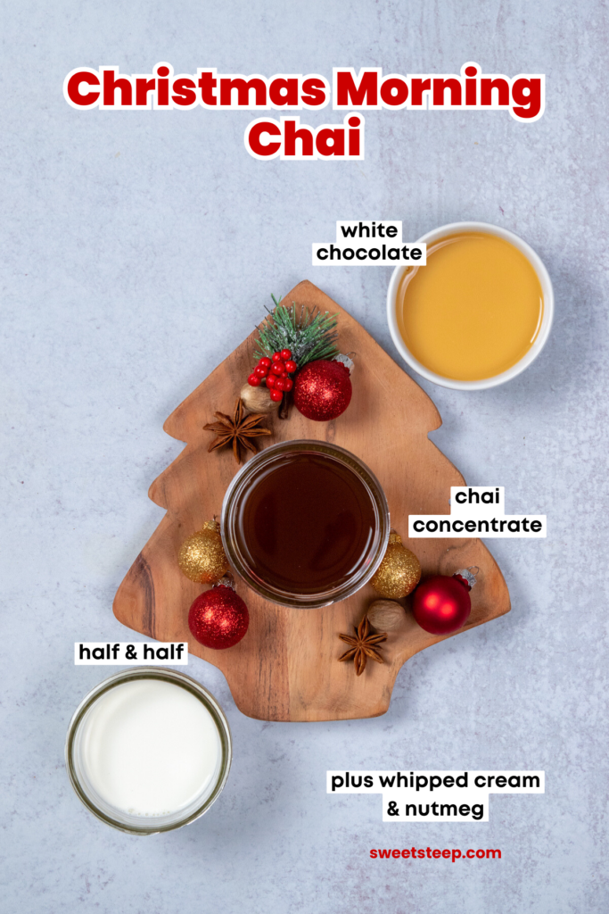 An overhead picture of the three main ingredients needed to make a Christmas morning chai like Dutch Bros. There's a bowl of Oregon chai sitting in the center of a wooden Christmas tree shaped tray that has some red and gold ball ornaments strewn about. Next to the tray is a small bowl with Torani white chocolate sauce and another bowl with half and half. Each ingredients has a text label. The image has text overlay that reads, "Christmas Morning Chai."