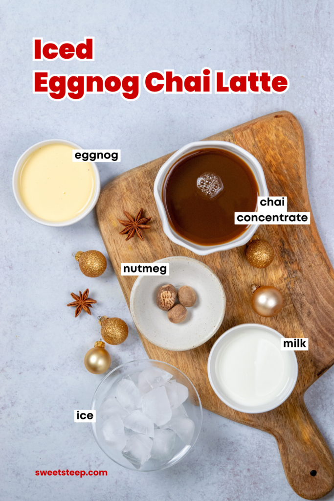 An overhead picture showing all the ingredients needed to make an iced eggnog chai latte. There are bowls with rich yellow eggnog, chai tea concentrate, milk, ice cubes, and a few nutmegs.