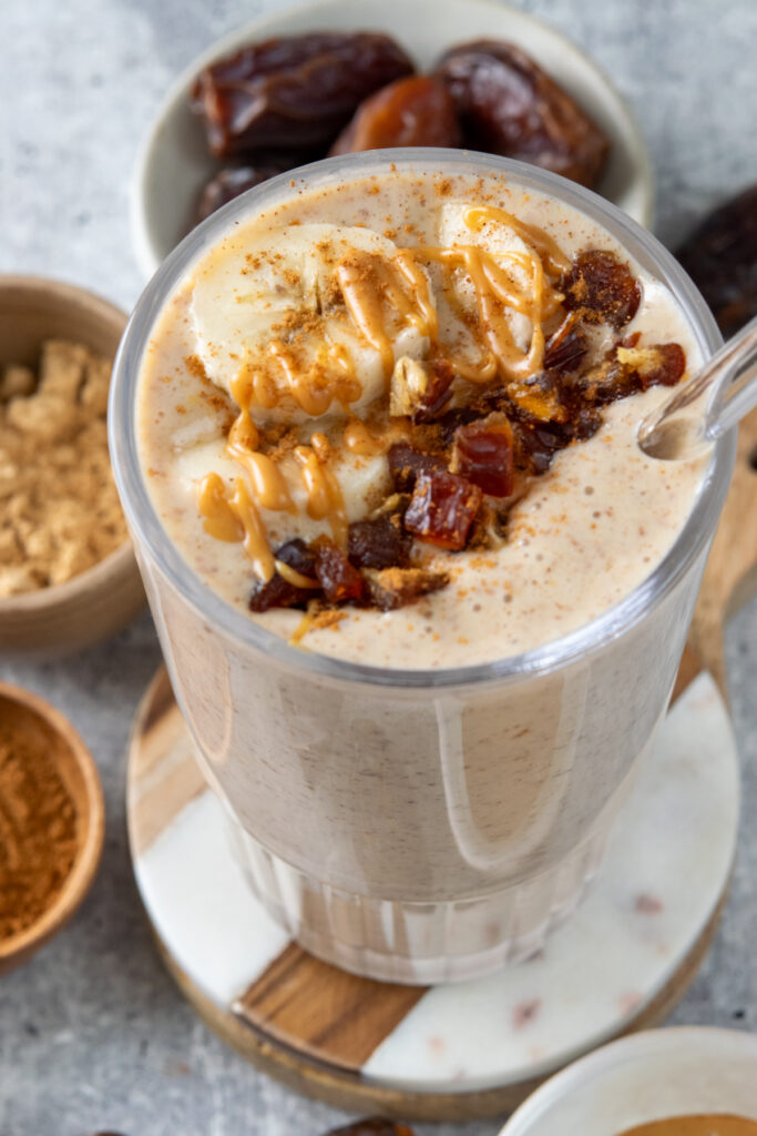 A homemade date smoothie, made with banana, peanut butter and Medjool dates.