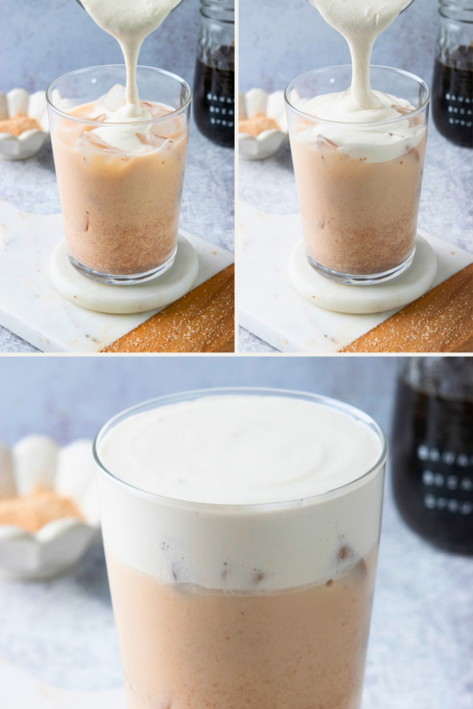 Banana bread cold foam being poured over an iced chai latte, creating a thick, creamy layer on top of the Starbucks copycat drink.